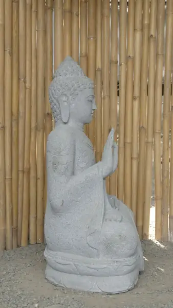 Product image 6 of the product “Seated Buddha with floral carving - Abhaya position. About 68cm length, 42cm width, 100cm height. Natural stone (river stone), stonemasonry ”